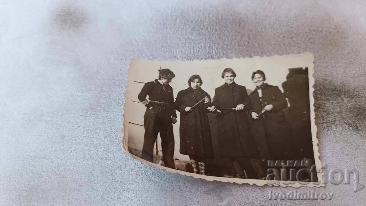 Photo Four young girls with conductor's batons Photo Four young girls with conductor's batons