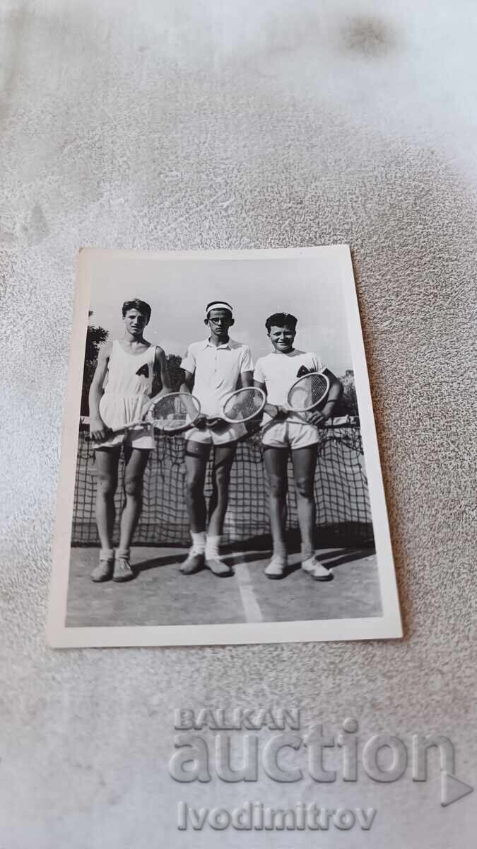 Photo Three young men on a tennis court 1952 Photo Three young men on a tennis court 1952