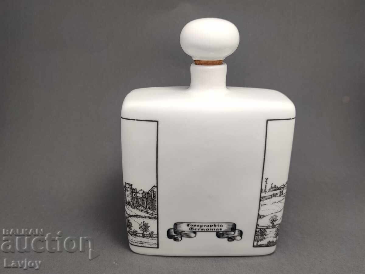 Auction Porcelain alcohol cup Auction Porcelain alcohol cup