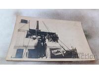 Photo Men and women aboard a steamer