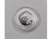 Lunar 1 oz. silver Year of the Dragon 2012. Starting at 1 cent.