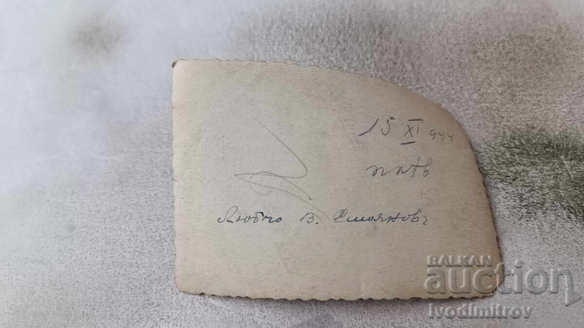 Photo Man and woman in front of Wine Shop 1944 with price 2.35 BGN | € 1.20 Photo Man and woman in front of Wine Shop 1944 with price 2.35 BGN | € 1.20