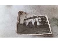 Photo Man and woman in front of Wine Shop 1944