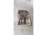 Photo Bezden Two officers in front of a cascade on a river 1954