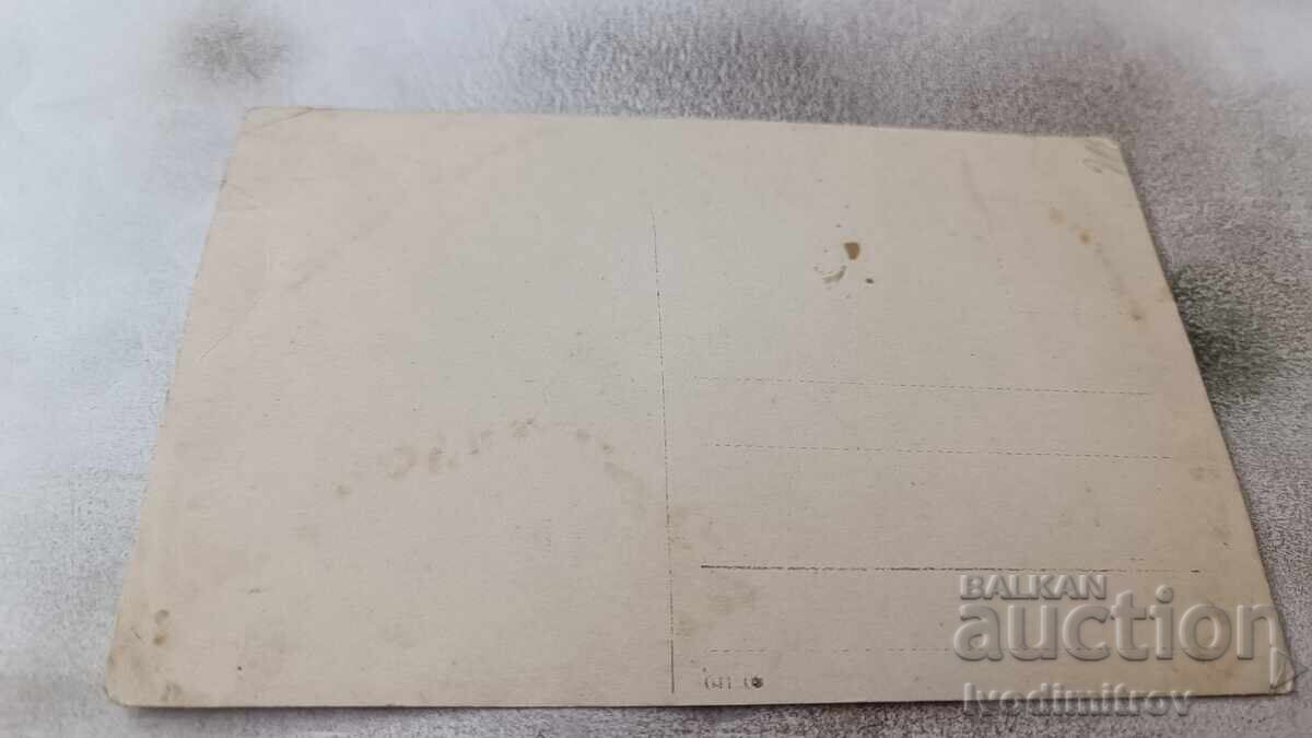 Photo Young girl in a white dress lying on a rock above the sea with price 2.45 BGN | € 1.25 Photo Young girl in a white dress lying on a rock above the sea with price 2.45 BGN | € 1.25