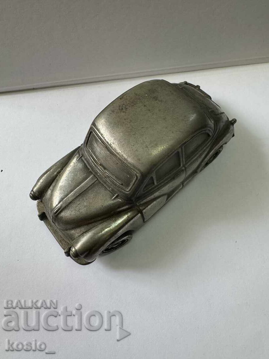 Auction  Old metal car paperweight
