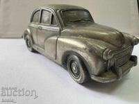 Old metal car paperweight