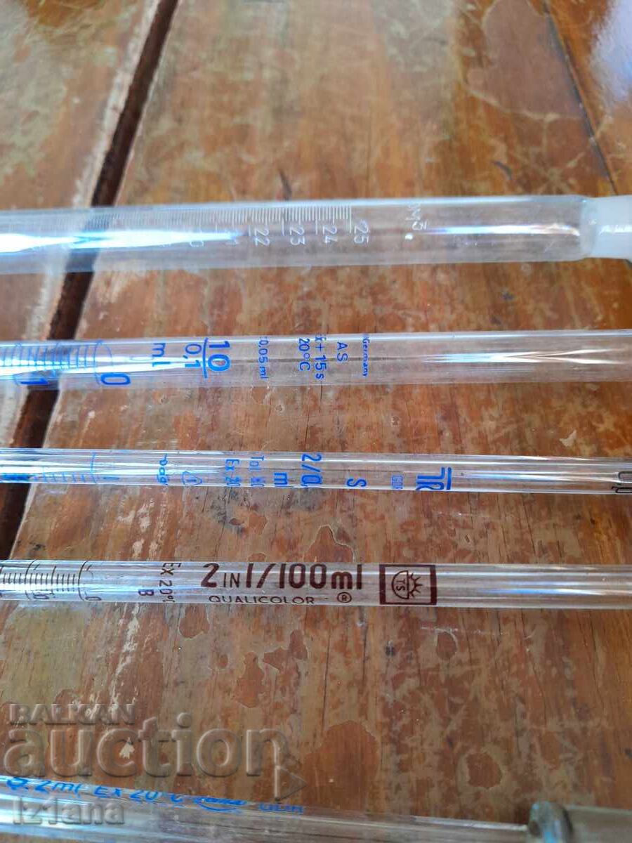 Auction Old glass pipettes Auction Old glass pipettes