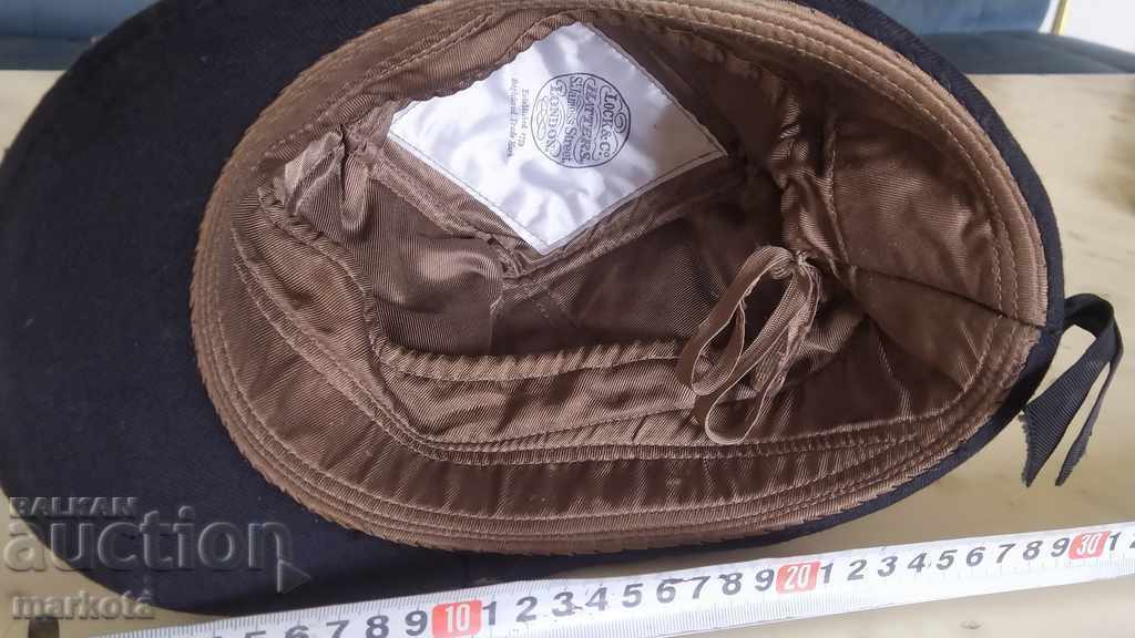 Delivery of Old English jockey hat.
