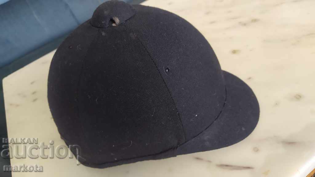 Old English jockey hat.