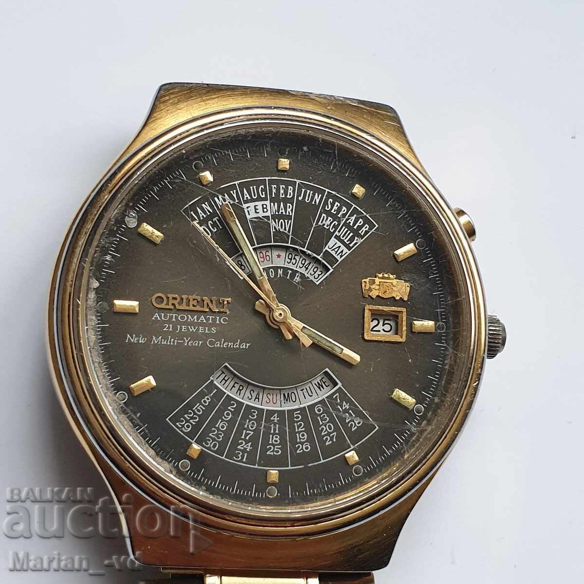 Auction  Clock Orient