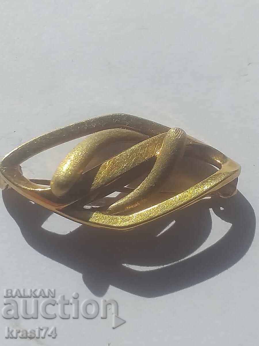 Old gilded brooch Old gilded brooch