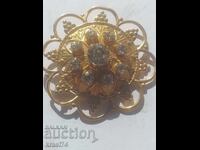 Gilded brooch