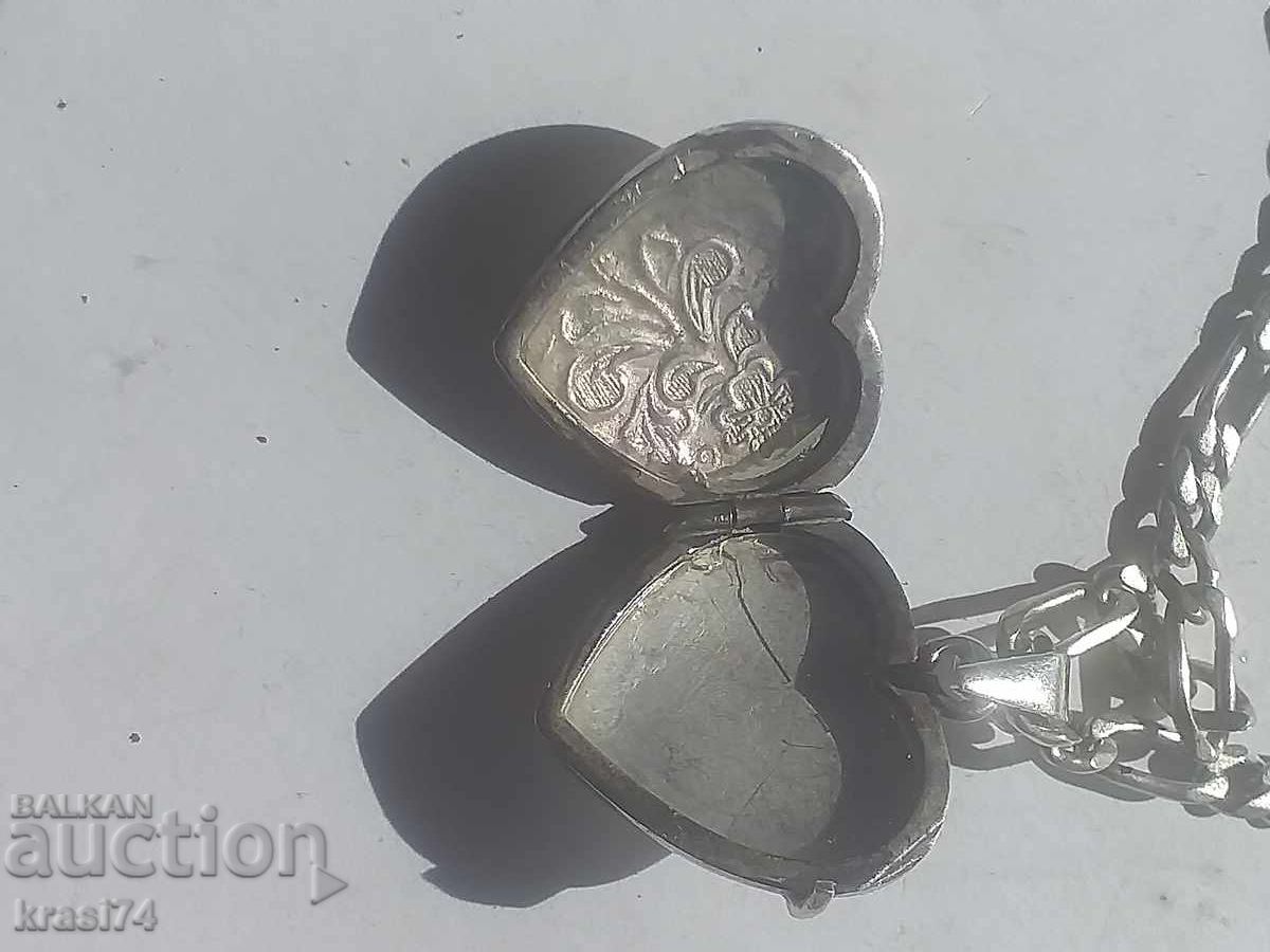Auction Silver chain with a heart for photos Auction Silver chain with a heart for photos