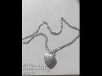 Silver chain with a heart for photos