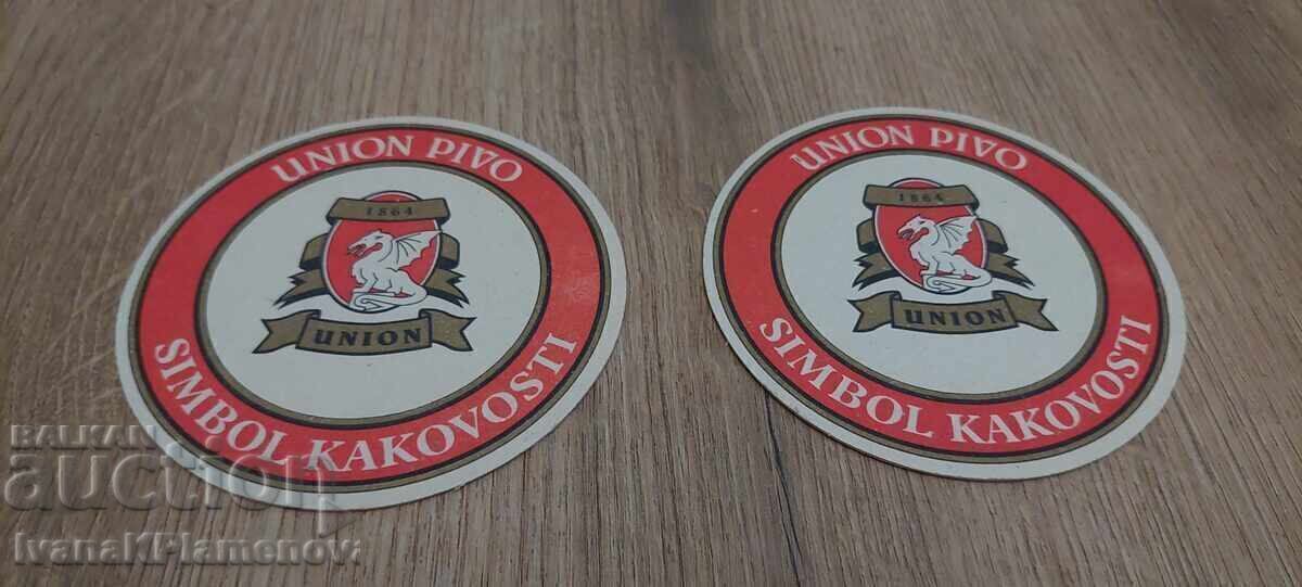 Auction  Collector's coasters, two pieces