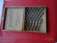 OLD cigar box with glass beads