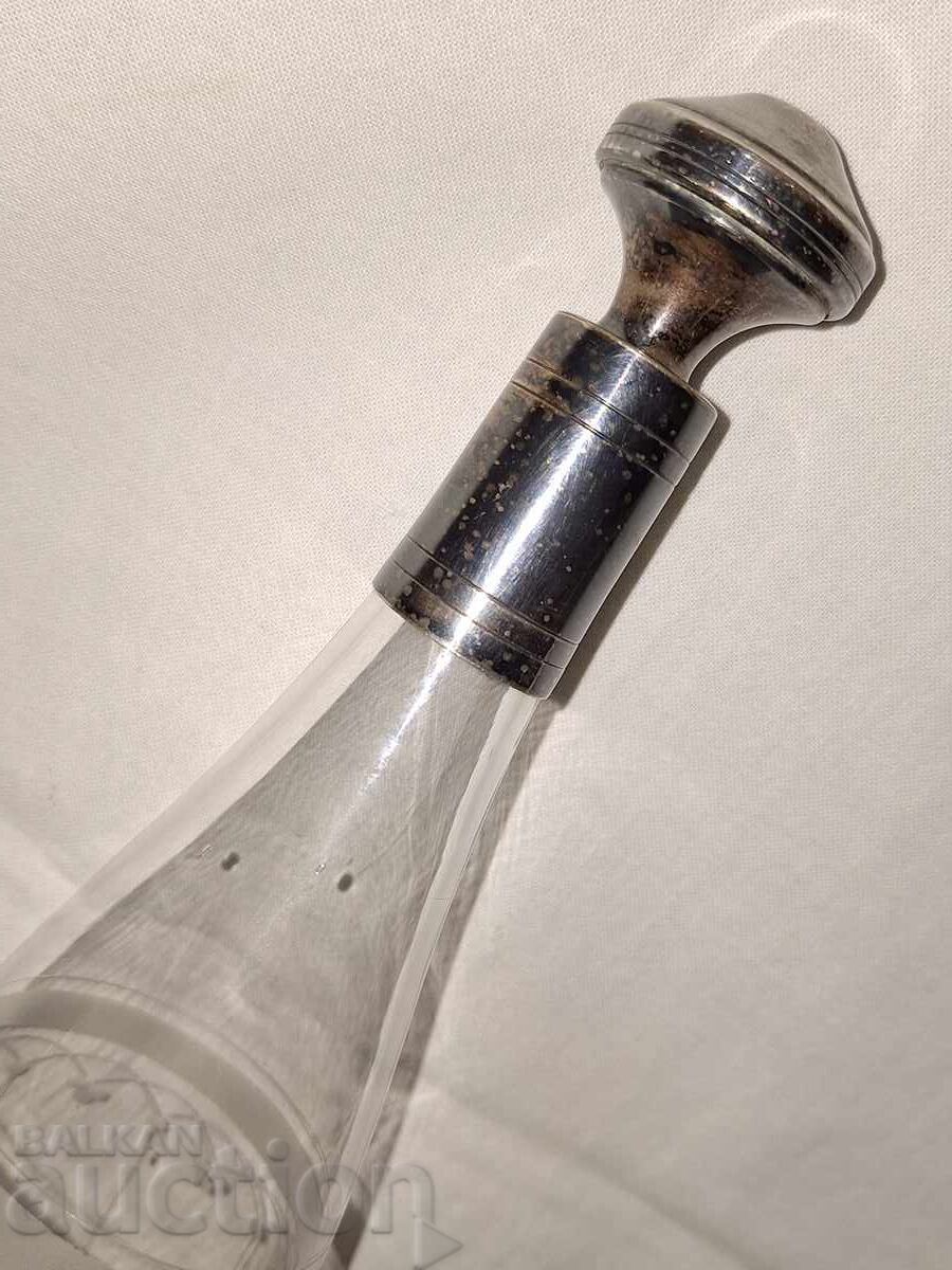Auction Old crystal carafe with silver-plated spout and stopper Auction Old crystal carafe with silver-plated spout and stopper