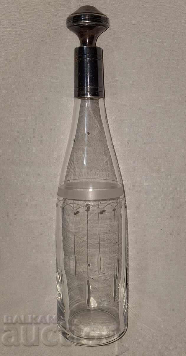 Old crystal carafe with silver-plated spout and stopper Old crystal carafe with silver-plated spout and stopper