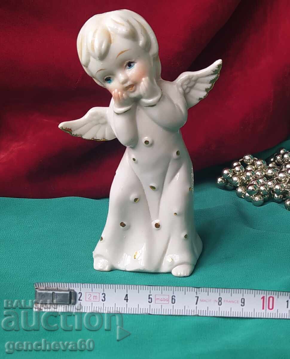Old porcelain angel with price 21.00 BGN | € 10.74 Old porcelain angel with price 21.00 BGN | € 10.74