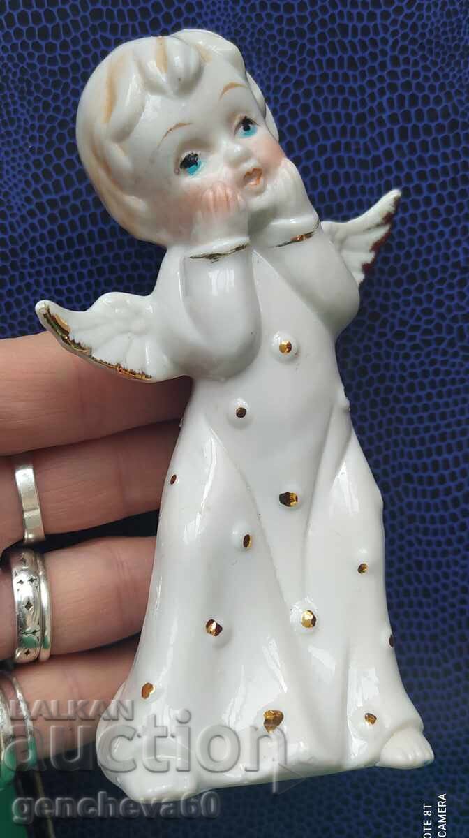 Delivery of Old porcelain angel Delivery of Old porcelain angel