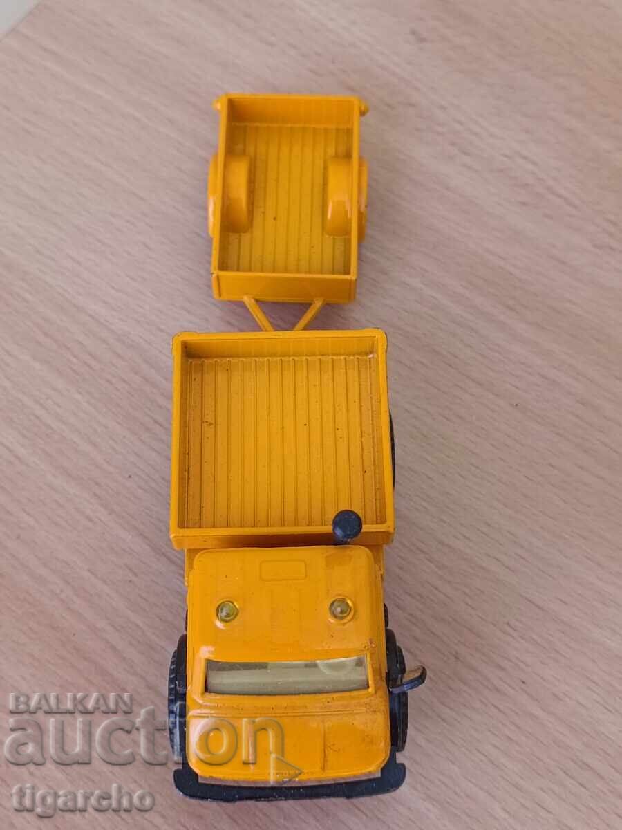 Delivery of Mercedes metal truck