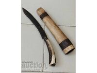 Old hunting knife with antler handle