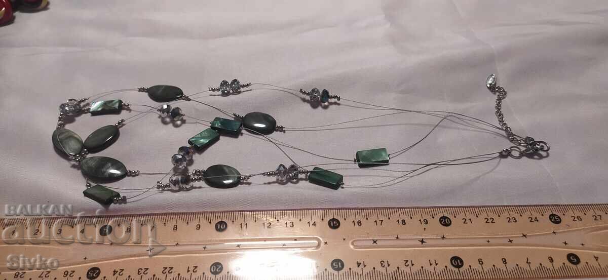 Necklace with mother-of-pearl and other elements Necklace with mother-of-pearl and other elements