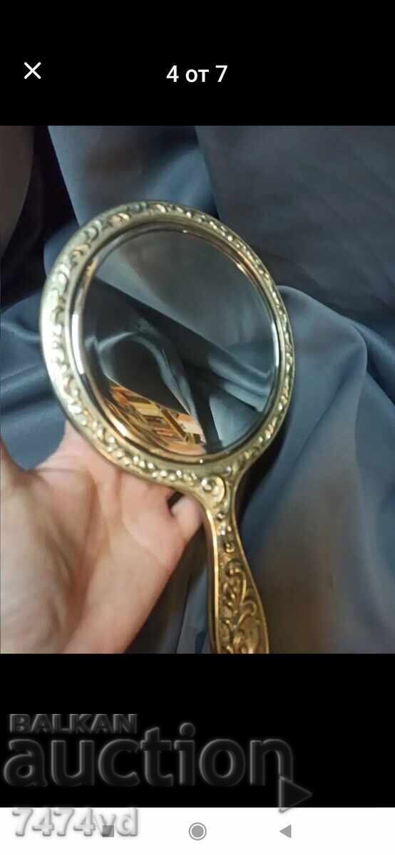 Delivery of Old ladies' mirror, massive with ornaments Delivery of Old ladies' mirror, massive with ornaments