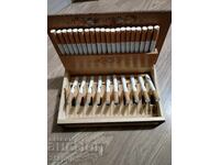 Arda cigarettes in a wooden cigarette box