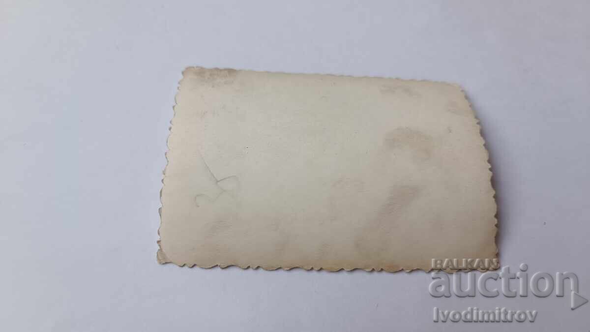 Photo Man and two boys in the sea with price 1.85 BGN | € 0.95