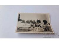 Photo Three young girls on a wooden pier in the sea 1937