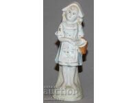 Old porcelain girl figurine