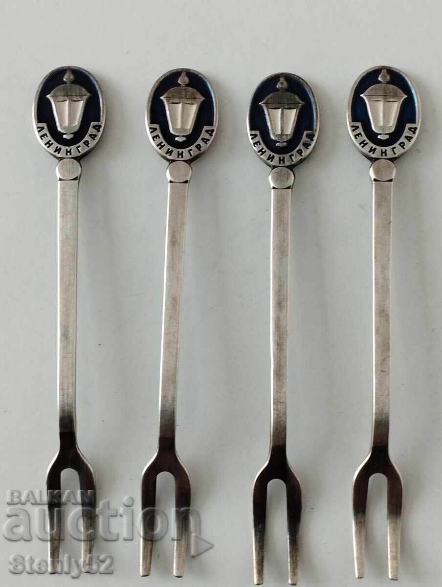 4 pcs. souvenir cupronickel silver-plated forks. 4 pcs. souvenir cupronickel silver-plated forks.