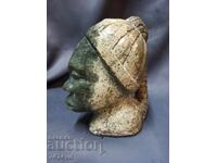 Old sculpture - stylized African female head jade