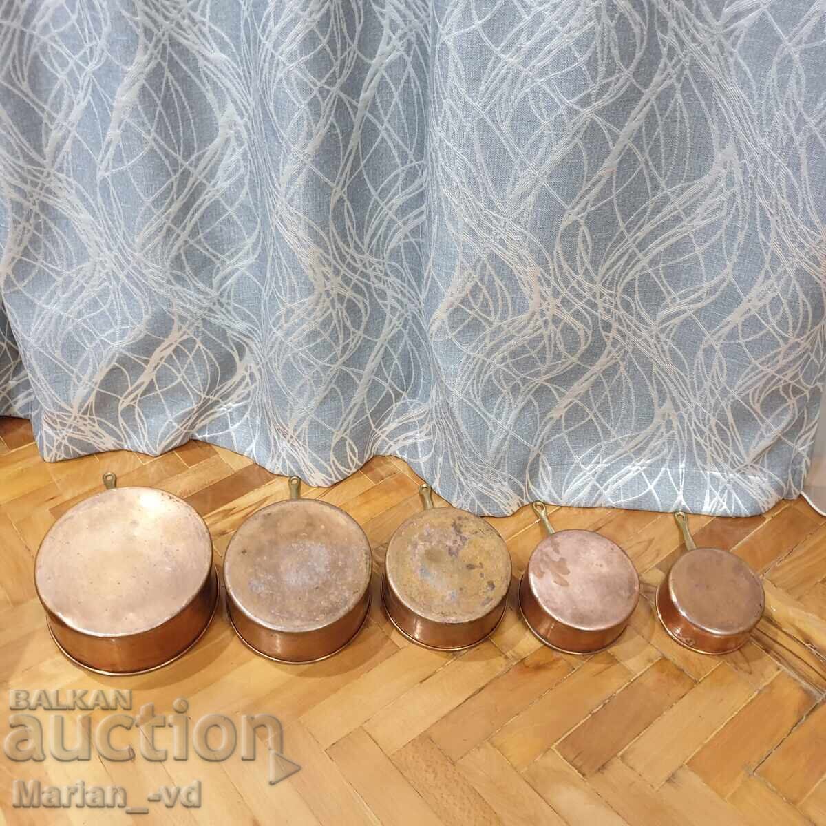 Set of copper pans with bronze handles - 7 Set of copper pans with bronze handles - 7