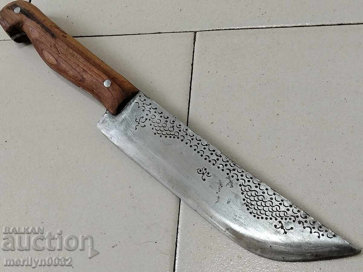 Old hunting knife with engravings for chopping wild boar