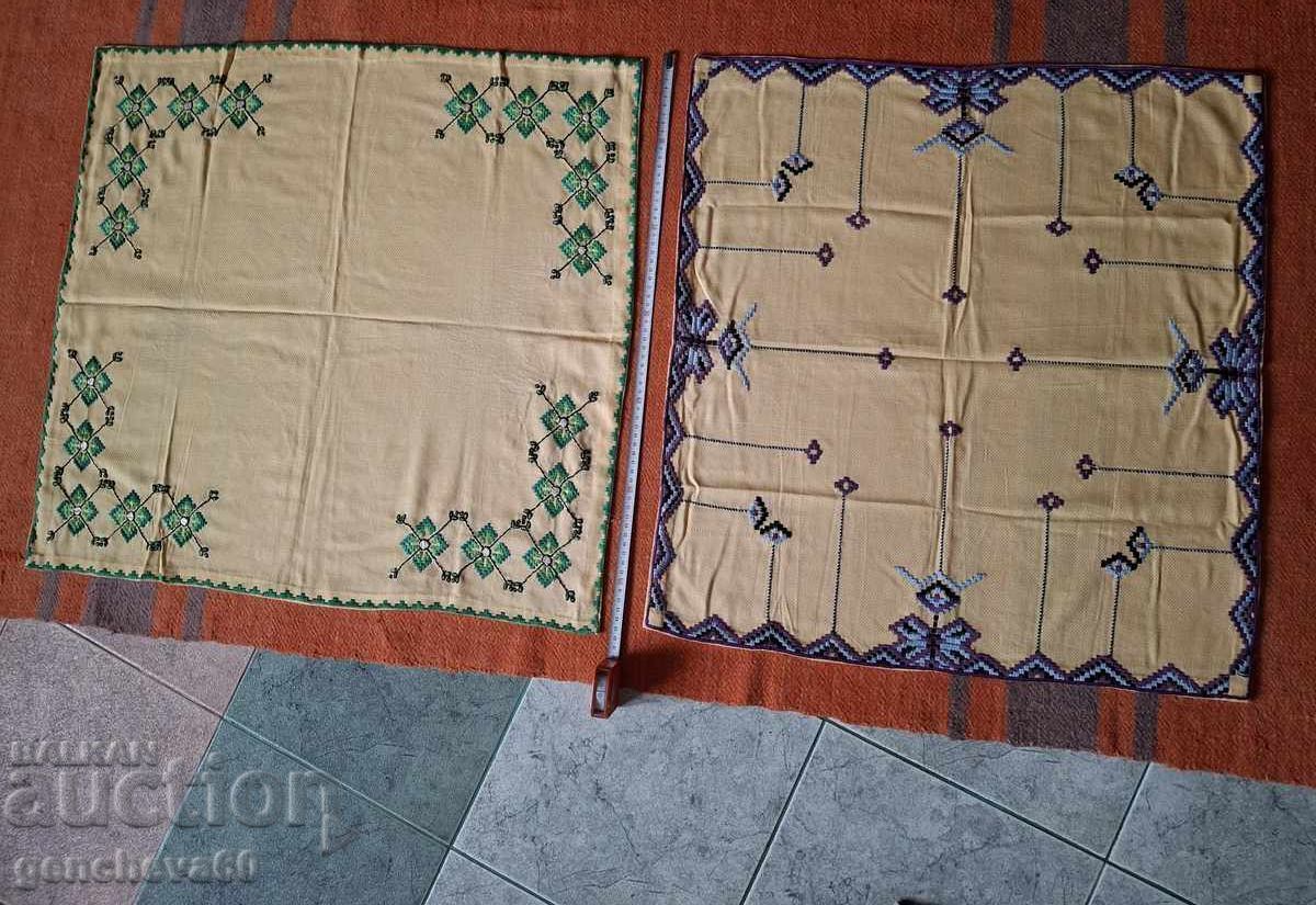 Two hand-embroidered table squares Two hand-embroidered table squares