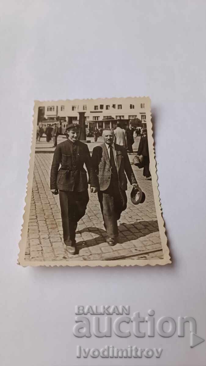 Photo Sofia A man and a young man on a walk Photo Sofia A man and a young man on a walk
