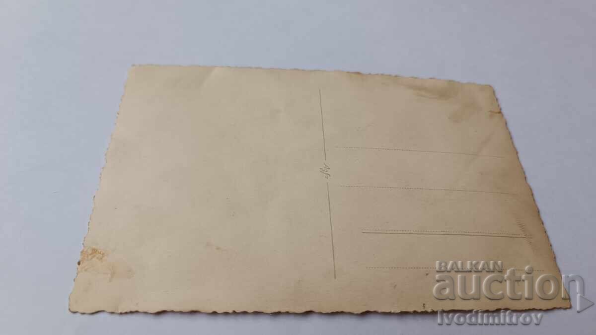 Photo Sofia Woman and two girls with winter coats on the sidewalk with price 3.65 BGN | € 1.87 Photo Sofia Woman and two girls with winter coats on the sidewalk with price 3.65 BGN | € 1.87