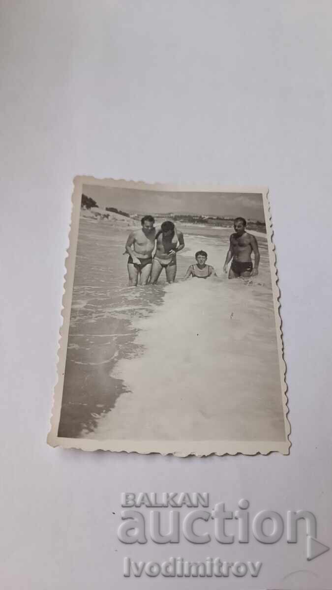 Photo Three Men and a Woman on the Seashore 1965 Photo Three Men and a Woman on the Seashore 1965