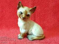 Old porcelain figure of a Cat