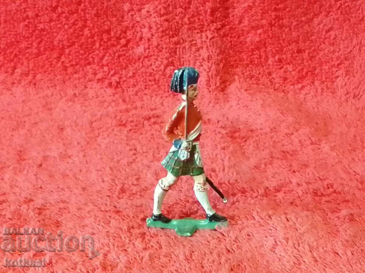 Old metal figure of a Soldier with a sword Old metal figure of a Soldier with a sword