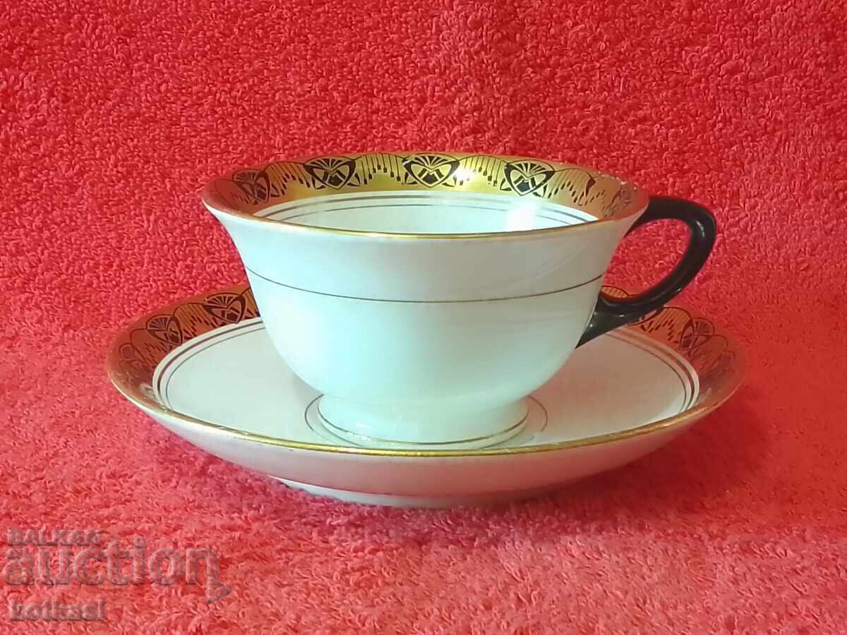 Auction  Old porcelain double set cup plate gilding HOLLAND