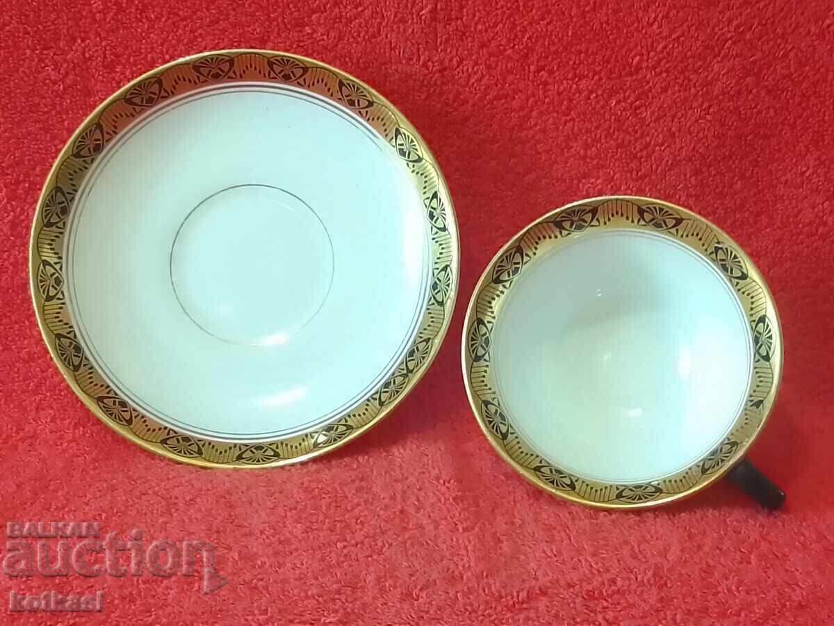 Delivery of Old porcelain double set cup plate gilding HOLLAND