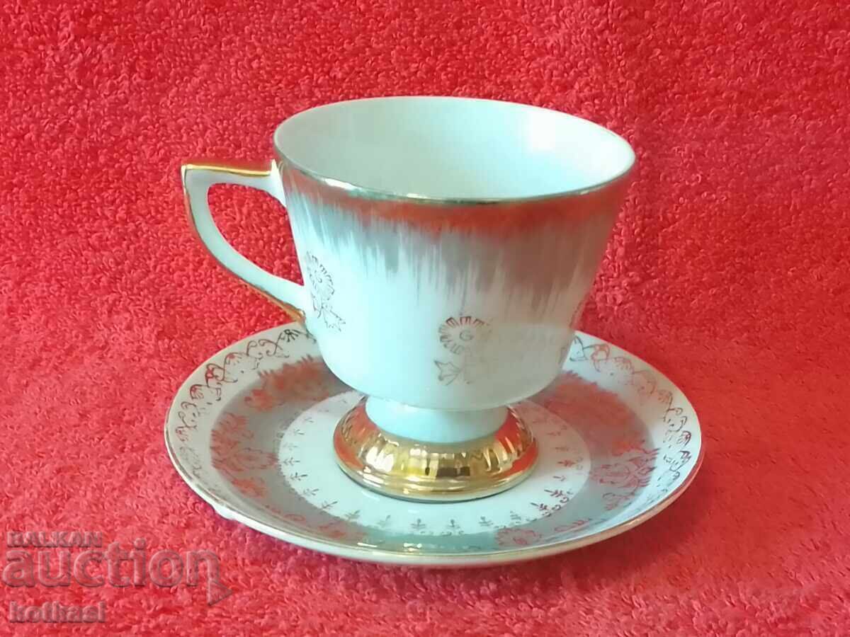 Auction  Old porcelain double set cup plate gilding man and woman