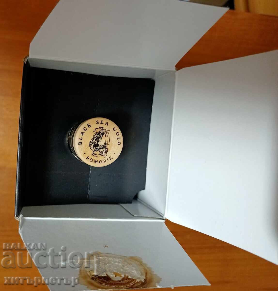 Cardboard box and bottle of Black Sea Gold VSOP brandy with price 2.50 BGN | € 1.28 Cardboard box and bottle of Black Sea Gold VSOP brandy with price 2.50 BGN | € 1.28