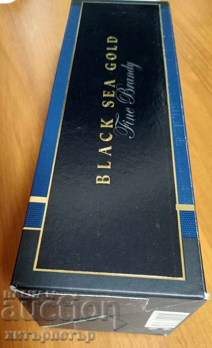 Delivery of Cardboard box and bottle of Black Sea Gold VSOP brandy Delivery of Cardboard box and bottle of Black Sea Gold VSOP brandy