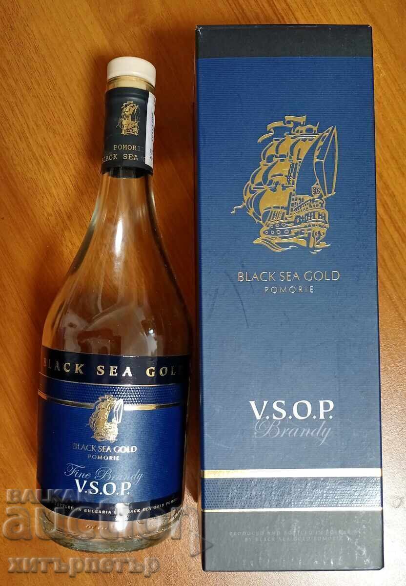 Cardboard box and bottle of Black Sea Gold VSOP brandy Cardboard box and bottle of Black Sea Gold VSOP brandy