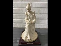 Unique collectible alabaster figure by Armani